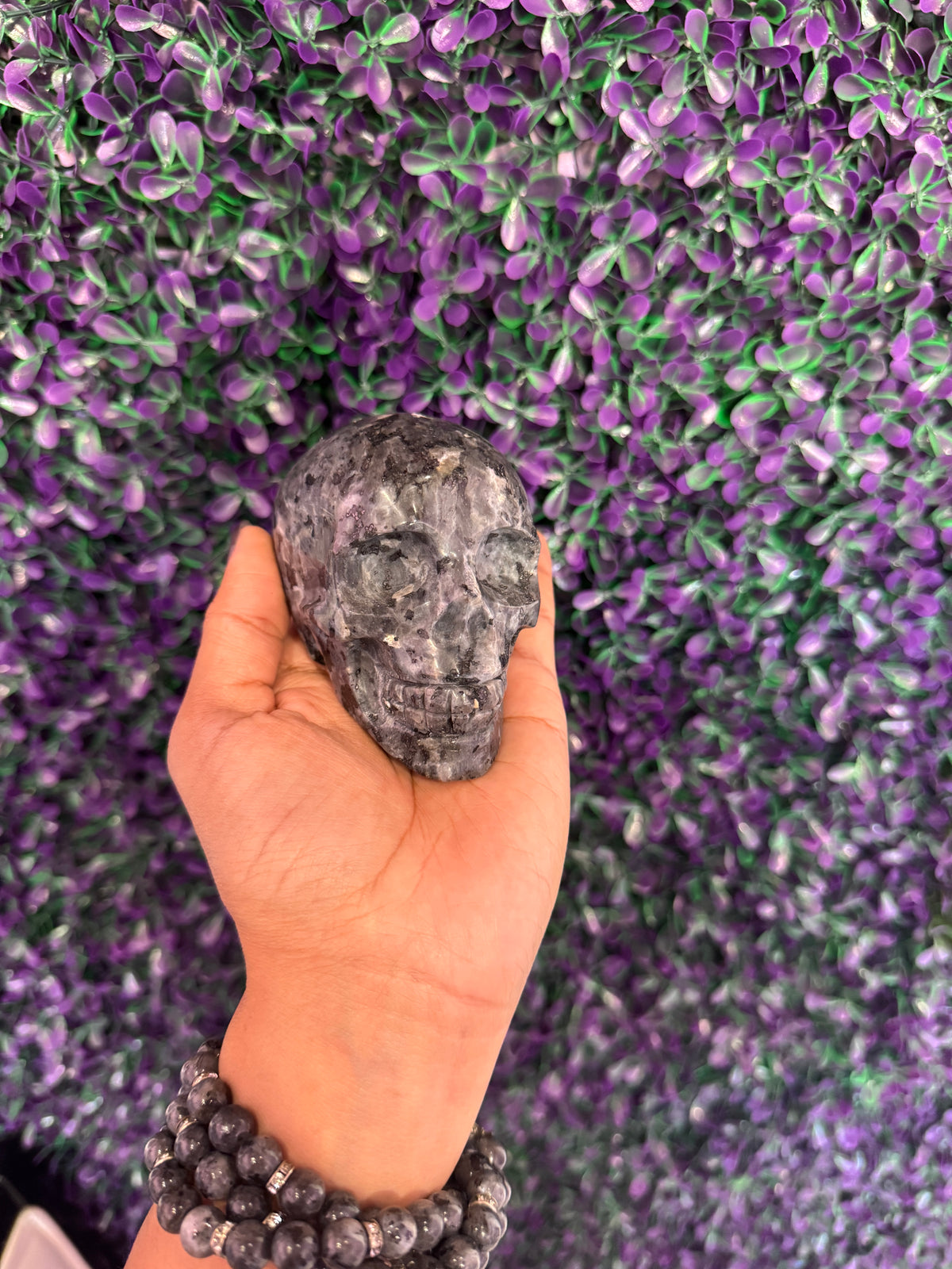 Gray Veined Skull Carving — product photo 3. A polished gray skull carving with pale veining and a beautifully intricate, mottled surface.
