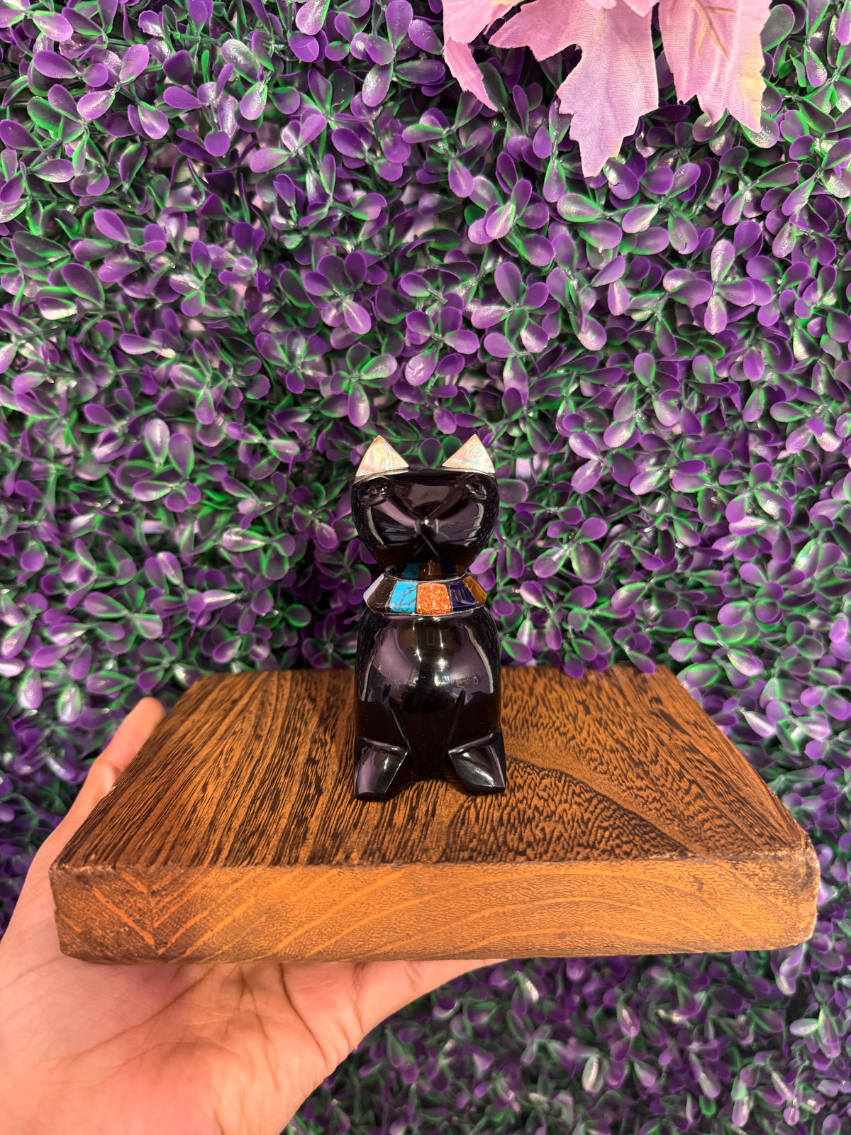 Black Cat Stone Carving — product photo 3. A polished black sitting cat with pointed ears, light ear accents, and a colorful turquoise, orange, and dark-blue inlaid collar.