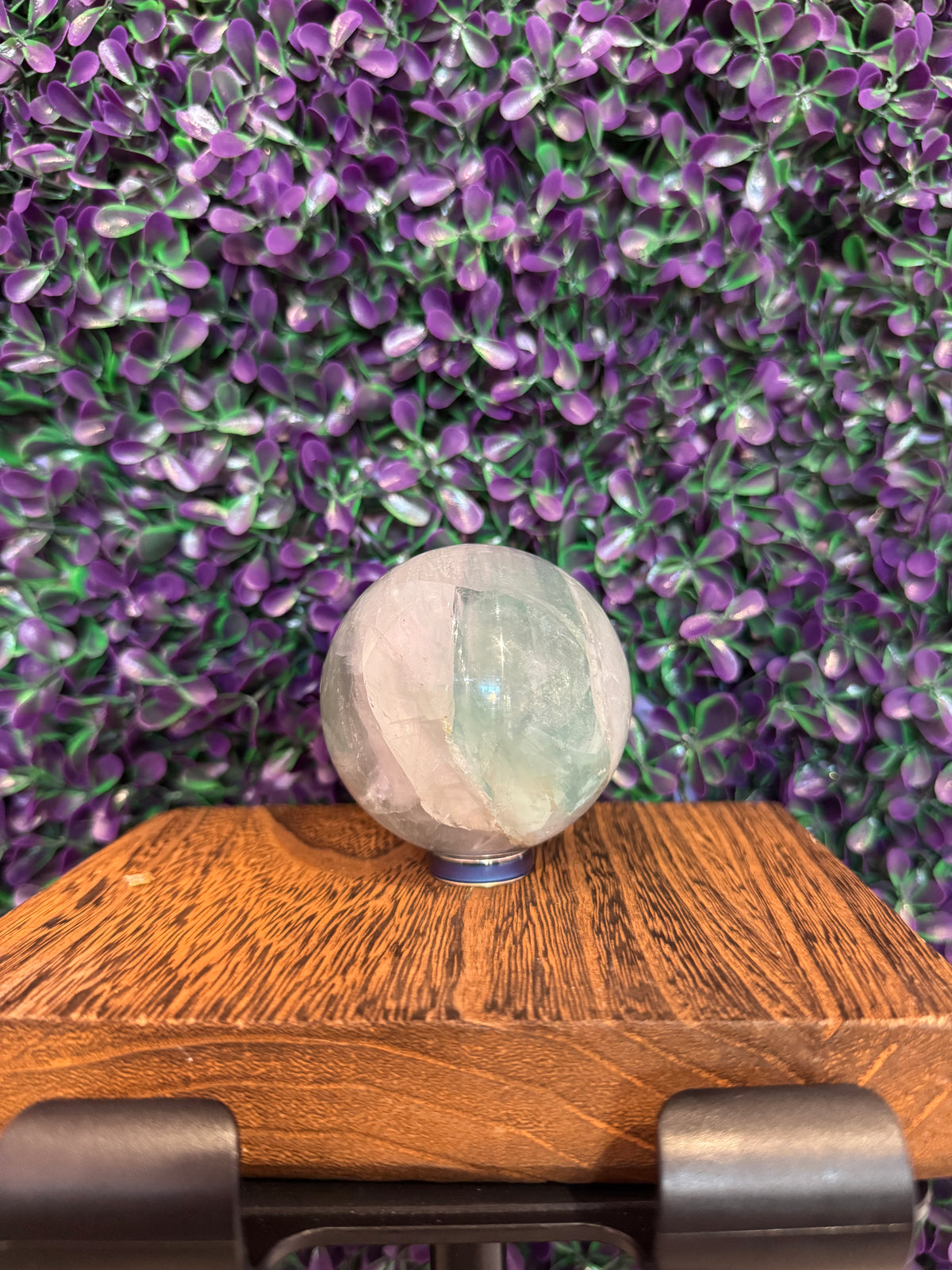 Pale Green and White Sphere — product photo 1. A polished sphere with translucent pale green and frosty white areas and intriguing internal detail.